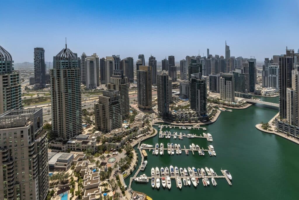 Comparison of Dubai Marina waterfront living and Downtown Dubai skyline luxury residences 
